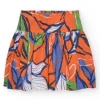 Jupe pour fille en orange avec taille élastique et imprimé floral.