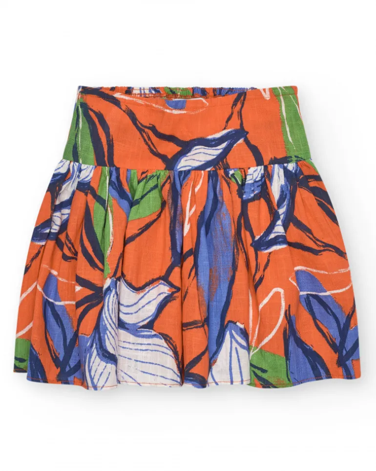 Jupe pour fille en orange avec taille élastique et imprimé floral.