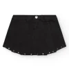 Jupe-short pour fille en noir avec détails métalliques.