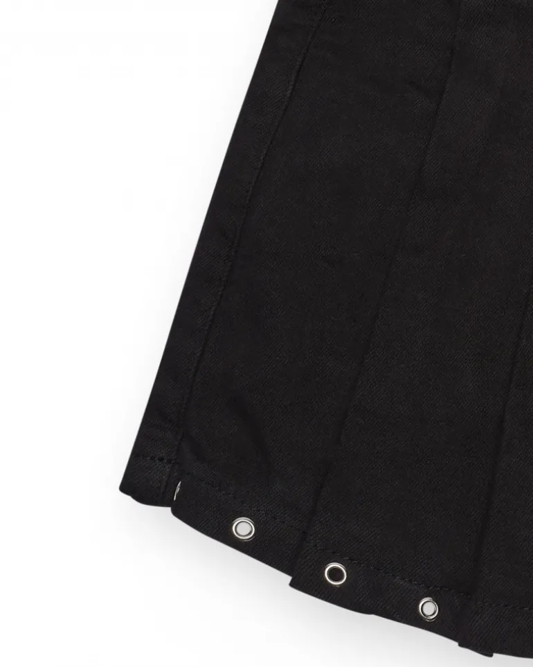 Jupe-short pour fille en noir avec détails métalliques.