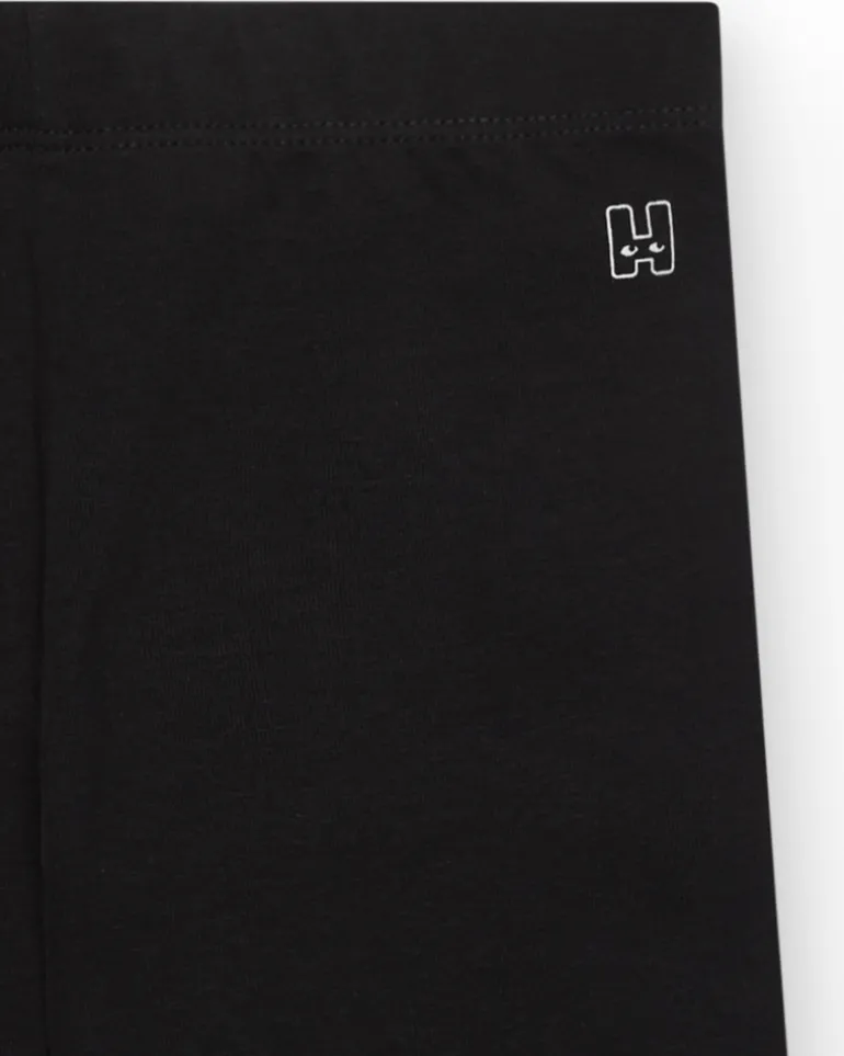 Legging court pour fille en noir avec taille élastique.