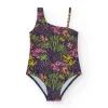 Maillot de bain pour fille en bleu marine avec design asymétrique et imprimé tropical.