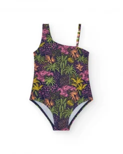 Maillot de bain pour fille en bleu marine avec design asymétrique et imprimé tropical.