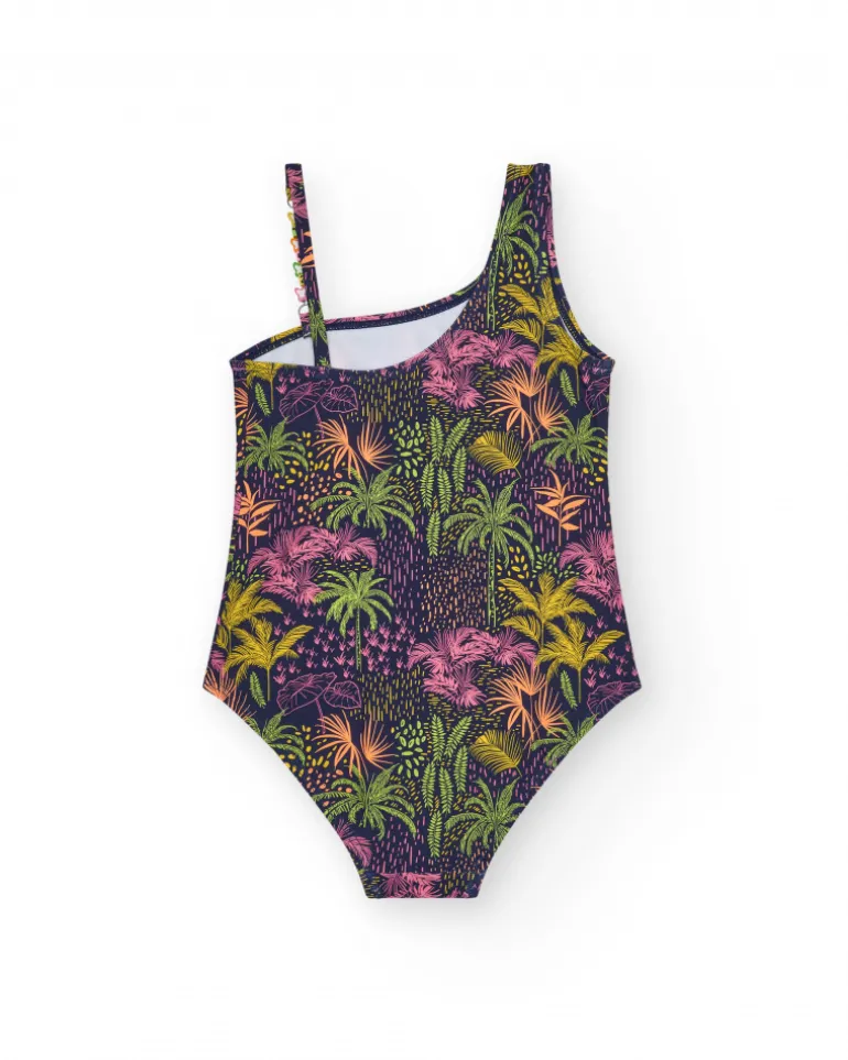 Maillot de bain pour fille en bleu marine avec design asymétrique et imprimé tropical.