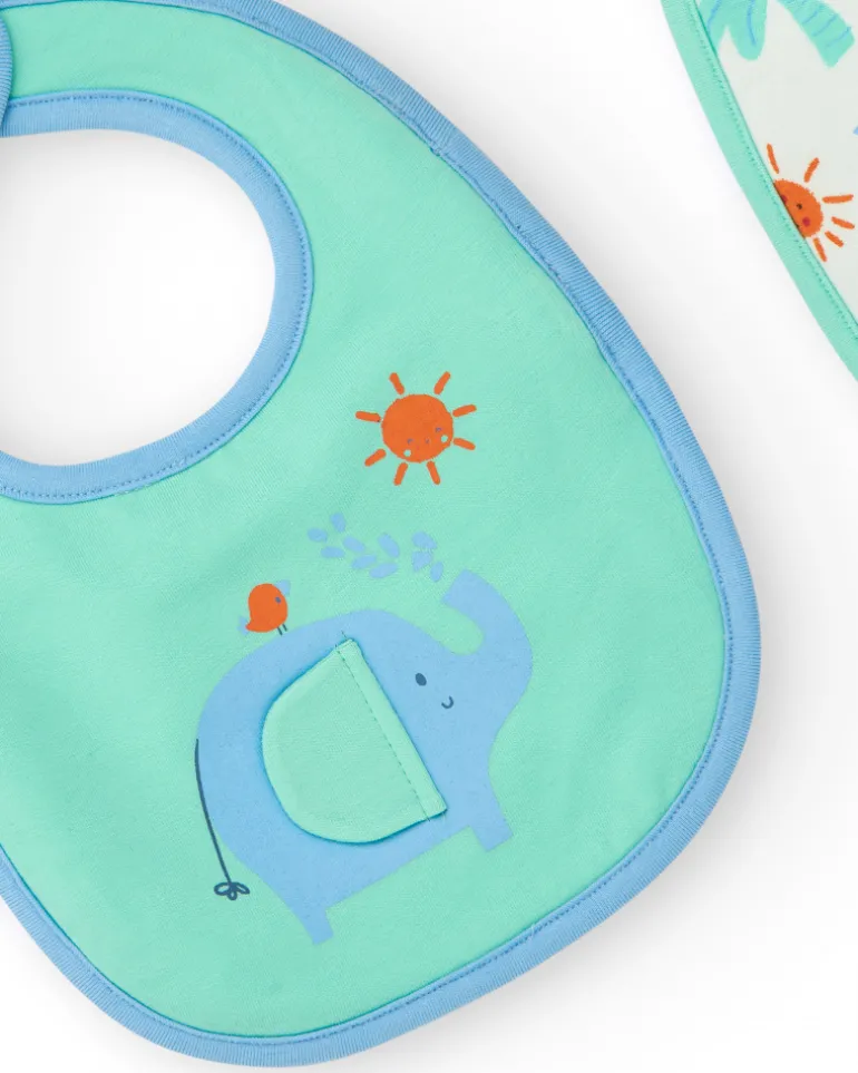 Pack de deux bavoirs pour garçon, un vert avec éléphant et l'autre avec palmiers et soleils