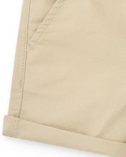 Pantalon court beige pour garçon avec poches et fermeture à bouton