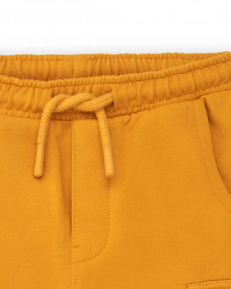 Pantalon garçon couleur moutarde avec poches cargo collection Super Natural