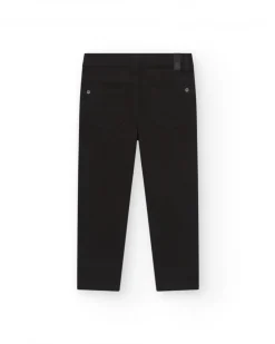 Pantalon noir pour garçon avec coupe ajustée et poches fonctionnelles.