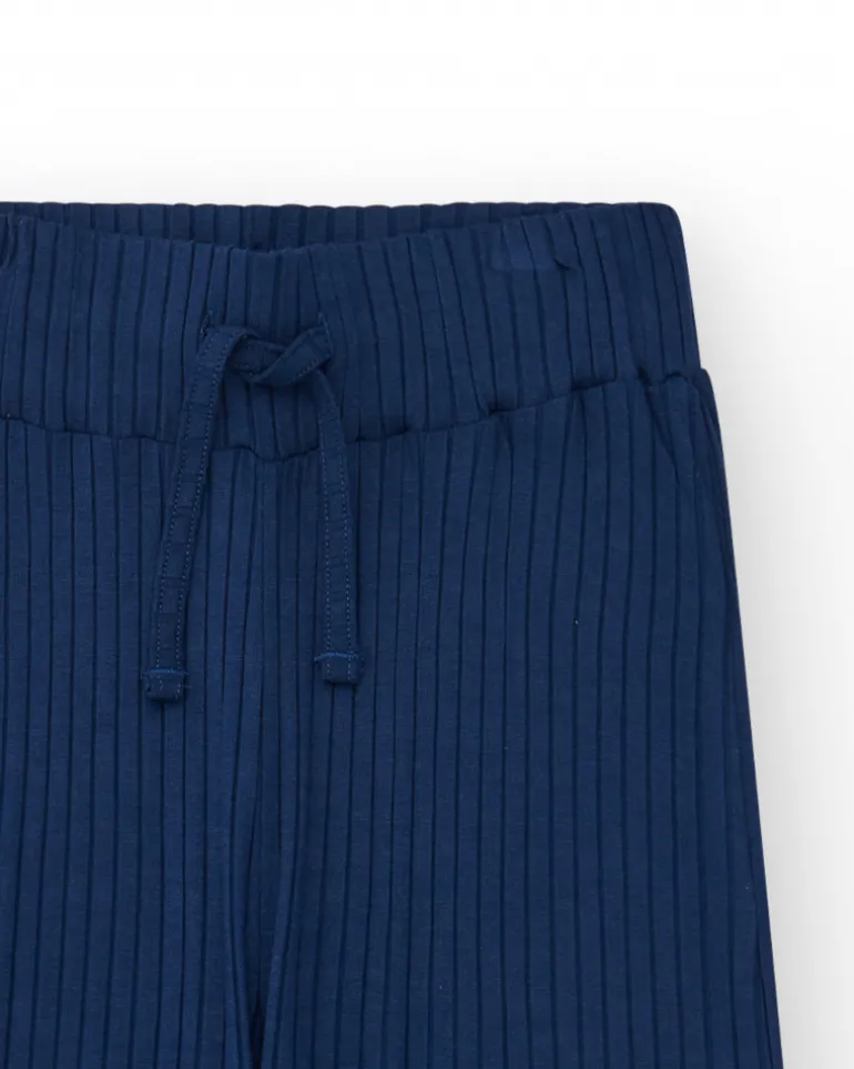 Pantalon pour fille en bleu avec taille élastique et cordon de serrage.