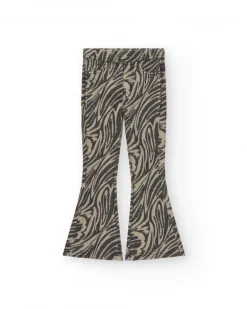 Pantalon pour fille en noir avec imprimé animal et clous à la taille.