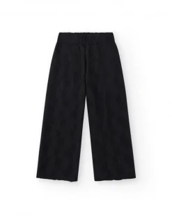 Pantalon pour fille en noir avec taille élastique et broderie.