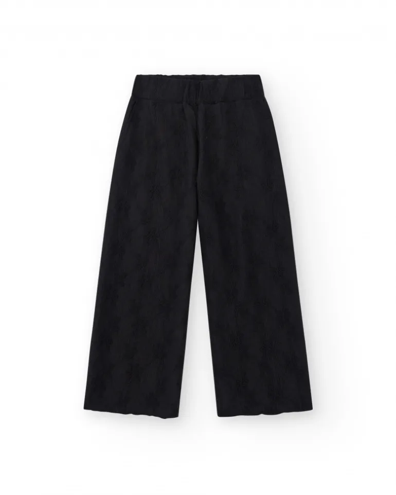 Pantalon pour fille en noir avec taille élastique et broderie.