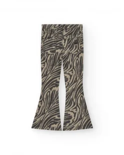 Pantalon pour fille en noir avec imprimé animal et clous à la taille.