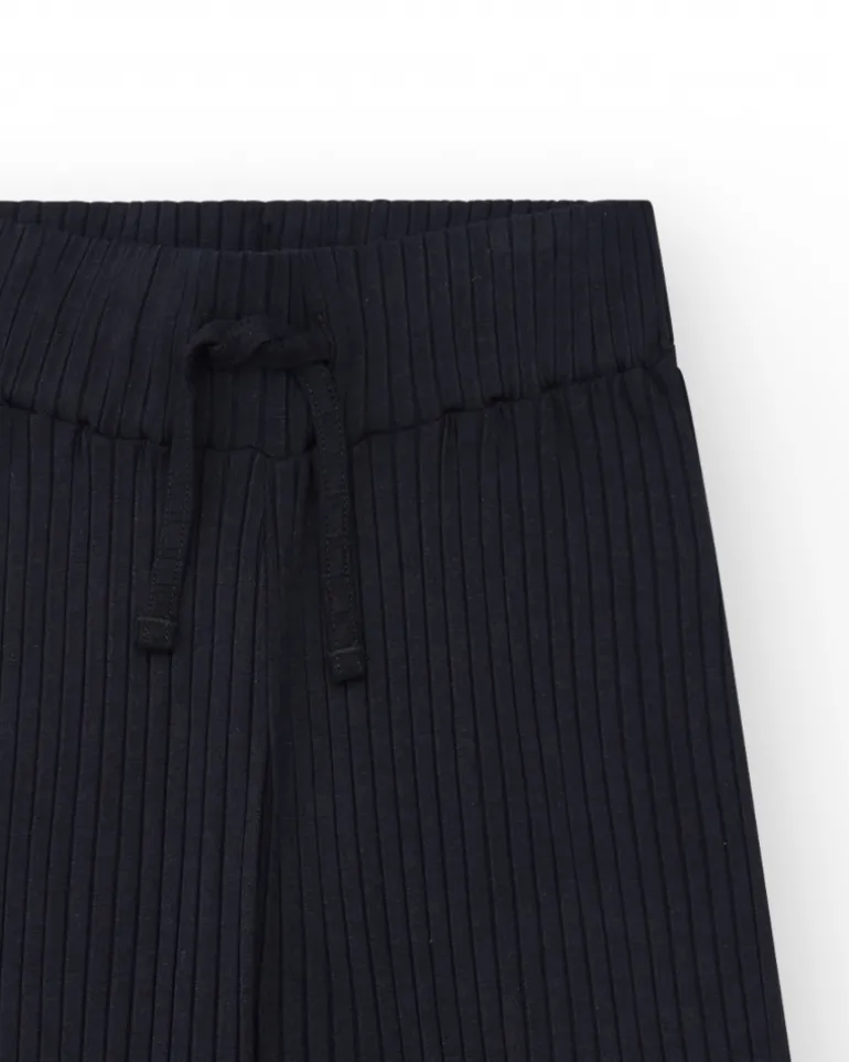Pantalon pour fille en noir avec taille élastique et cordon de serrage.