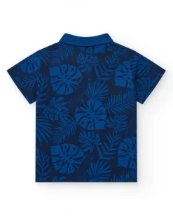 Polo pour garçon en bleu avec imprimé tropical et broderie.