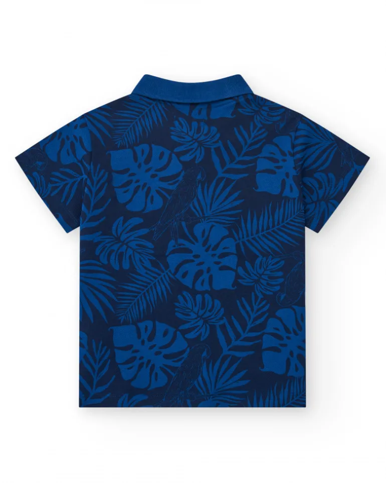Polo pour garçon en bleu avec imprimé tropical et broderie.
