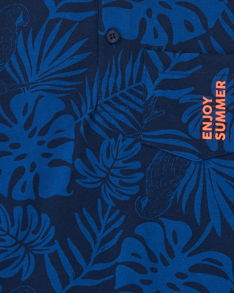 Polo pour garçon en bleu avec imprimé tropical et broderie.