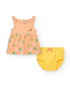 Robe couleur pêche pour fille avec imprimé floral et bretelles nouées