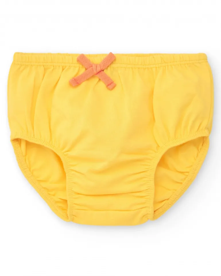 Robe couleur pêche pour fille avec imprimé floral et bretelles nouées
