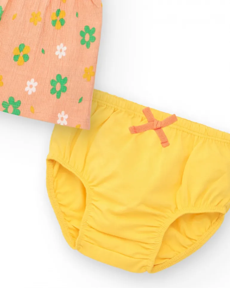 Robe couleur pêche pour fille avec imprimé floral et bretelles nouées