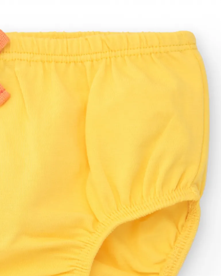 Robe couleur pêche pour fille avec imprimé floral et bretelles nouées