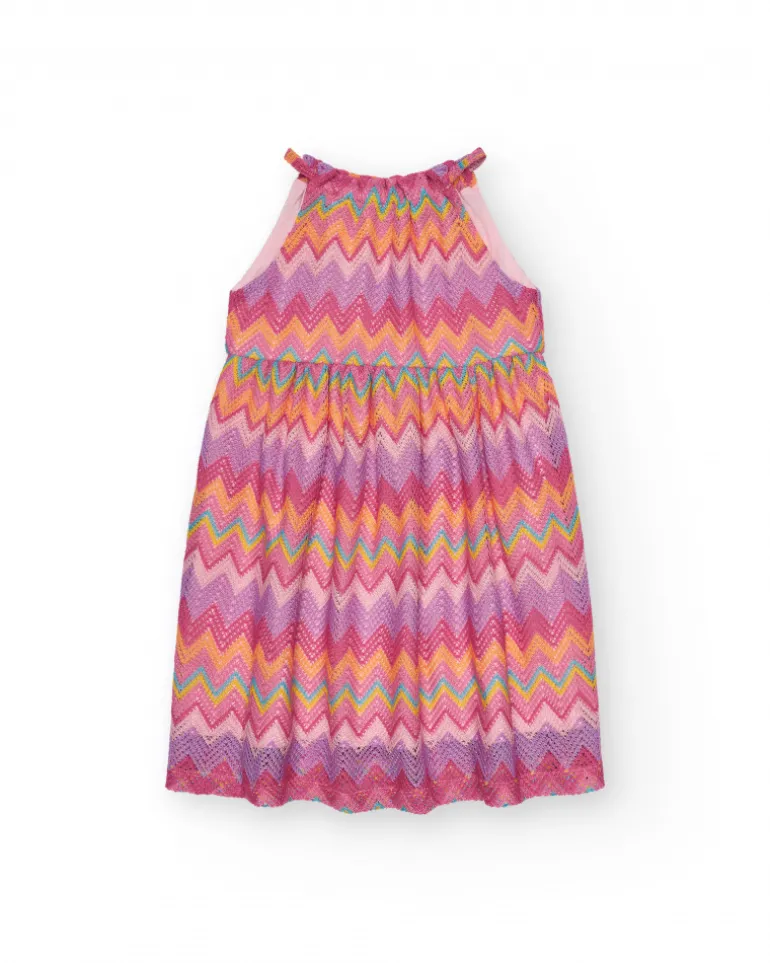 Robe pour fille avec imprimé multicolore et bretelles ajustables.