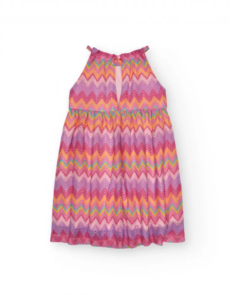 Robe pour fille avec imprimé multicolore et bretelles ajustables.