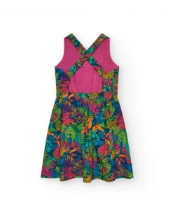Robe pour fille avec imprimé tropical multicolore et bretelles croisées.
