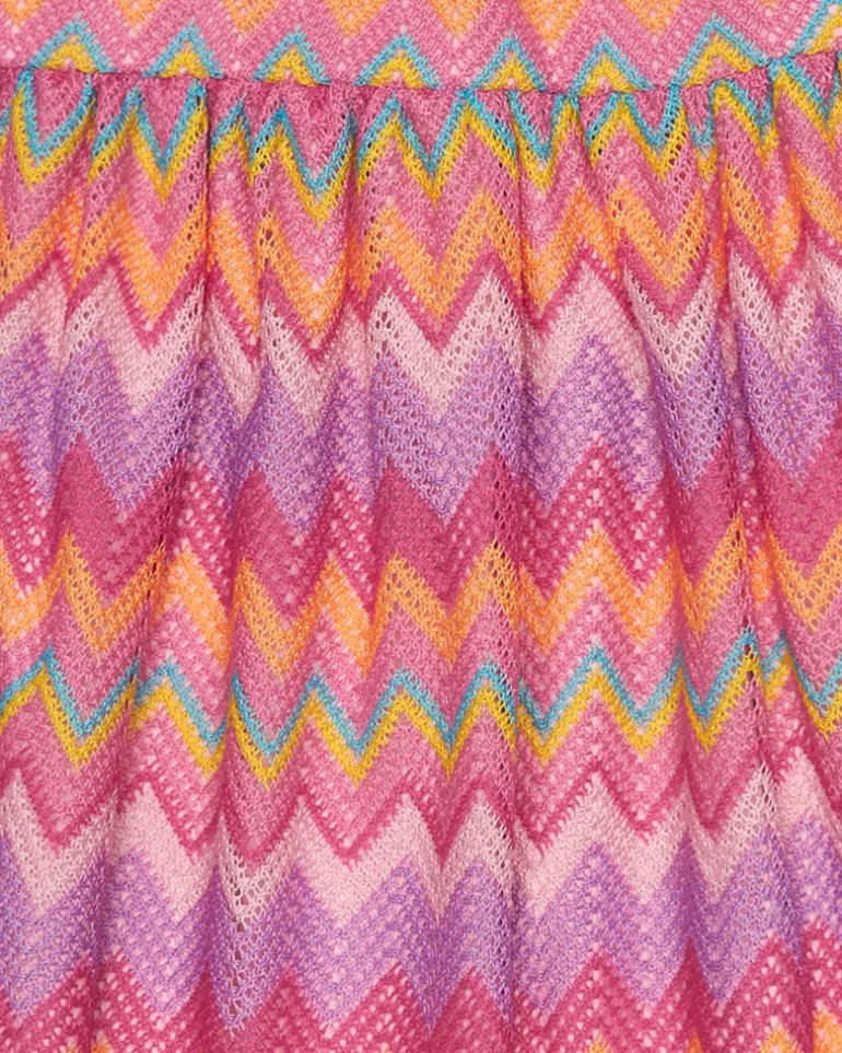 Robe pour fille avec imprimé multicolore et bretelles ajustables.