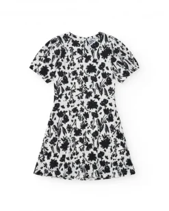 Robe pour fille en blanc et noir avec manches bouffantes et imprimé floral.