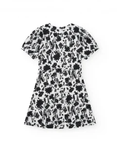 Robe pour fille en blanc et noir avec manches bouffantes et imprimé floral.