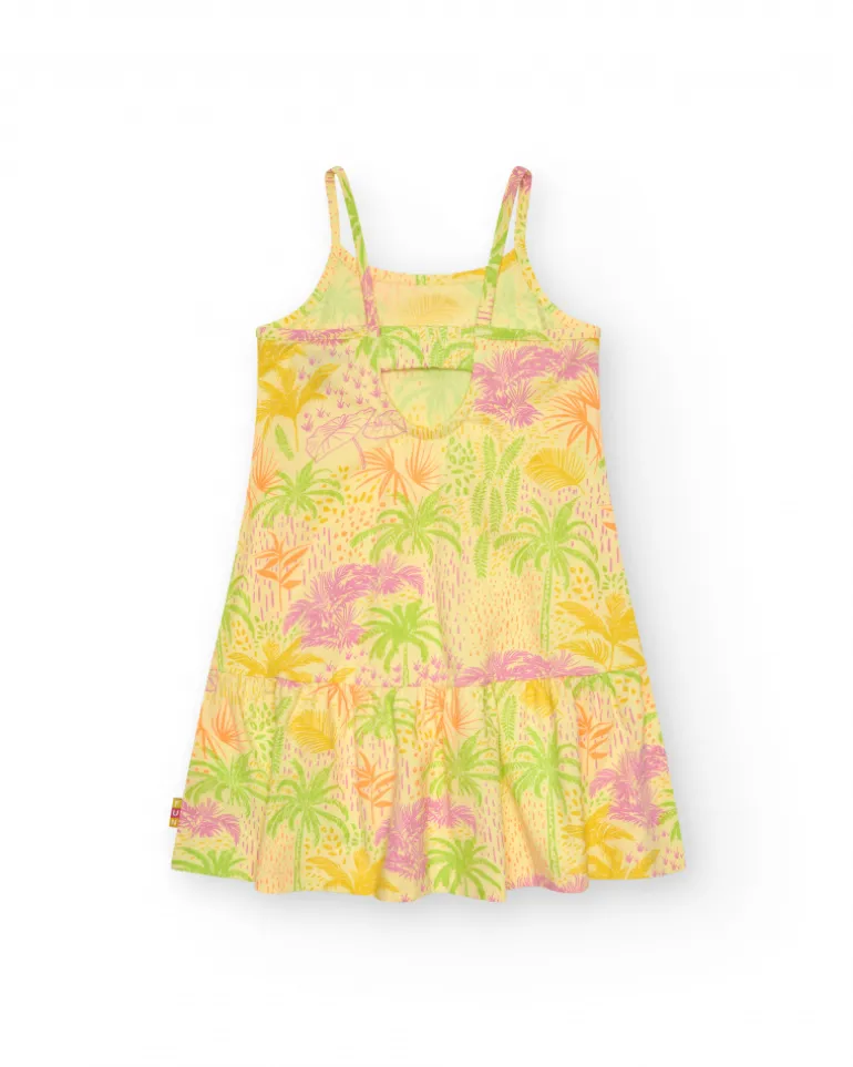 Robe pour fille en jaune avec bretelles et imprimé tropical.