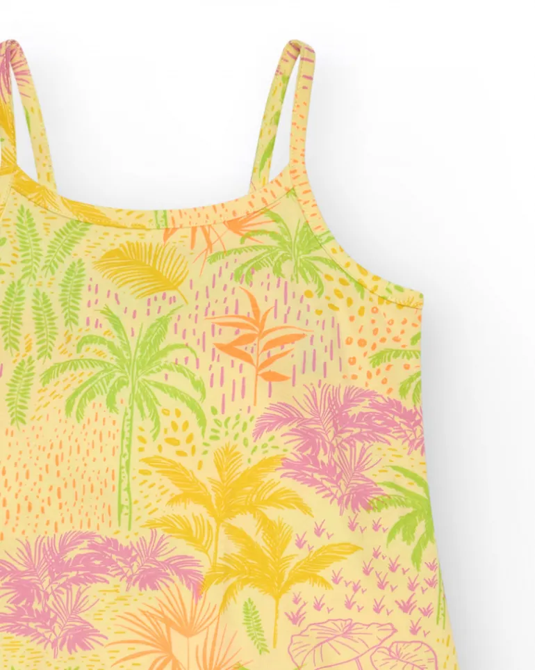 Robe pour fille en jaune avec bretelles et imprimé tropical.