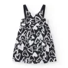 Robe pour fille en noir avec bretelles ajustables et appliques.