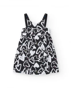 Robe pour fille en noir avec bretelles ajustables et appliques.