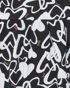 Robe pour fille en noir avec bretelles ajustables et appliques.