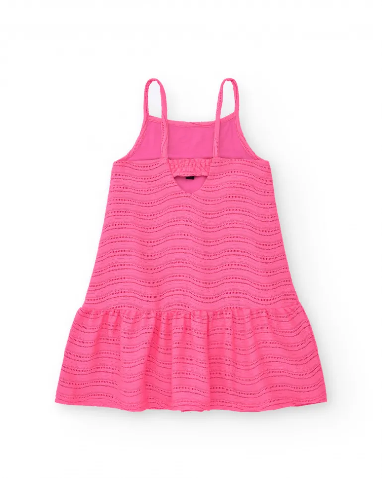 Robe pour fille en rose avec bretelles et volant.