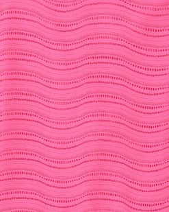 Robe pour fille en rose avec bretelles et volant.