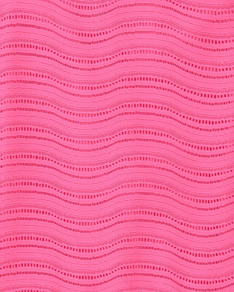 Robe pour fille en rose avec bretelles et volant.