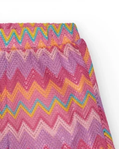 Short multicolore pour fille avec imprimé et taille élastique.
