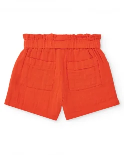 Short orange pour fille avec nœud et poches latérales