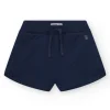 Short pour fille en bleu avec taille élastique et poches.