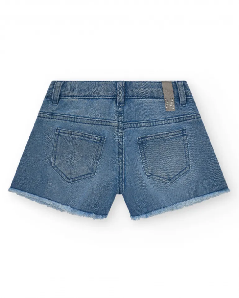 Short pour fille en bleu avec détails brillants et ourlet effiloché