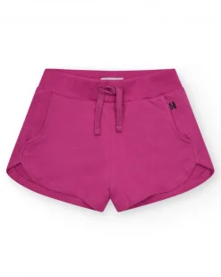 Short pour fille en fuchsia avec taille élastique et poches.