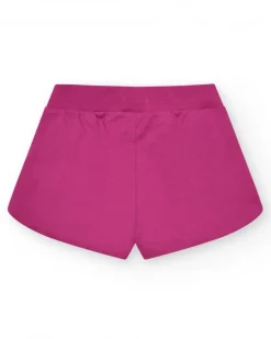 Short pour fille en fuchsia avec taille élastique et poches.
