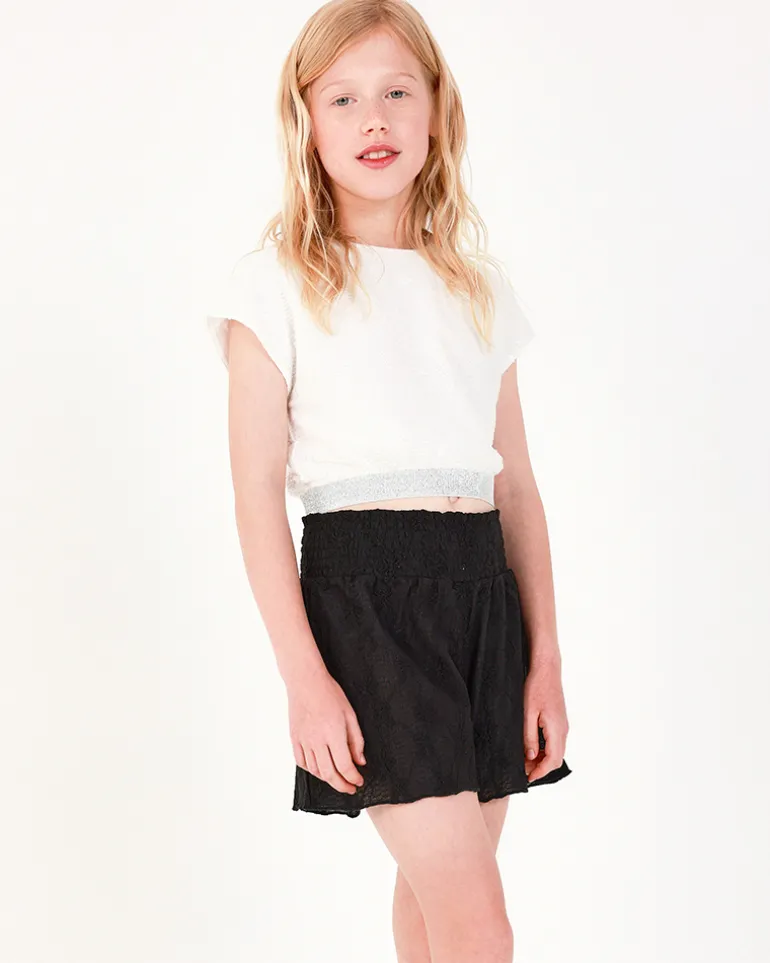 Short pour fille en noir avec taille élastique et imprimé floral.