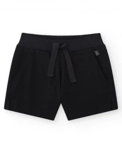 Short pour fille en noir avec taille élastique et poches.