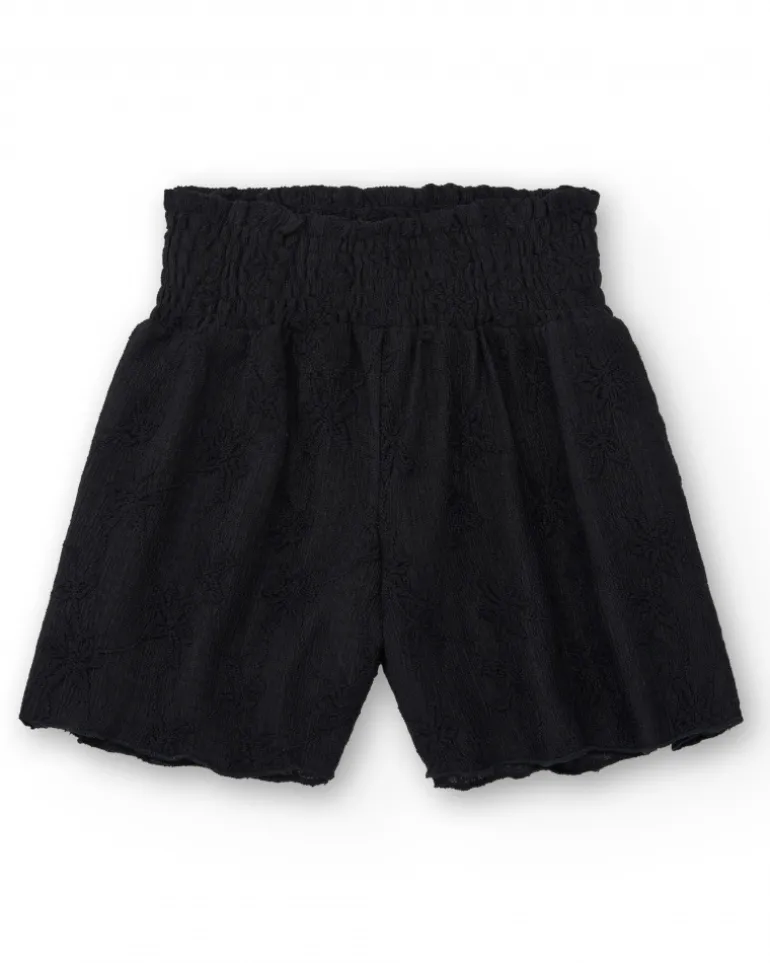 Short pour fille en noir avec taille élastique et imprimé floral.