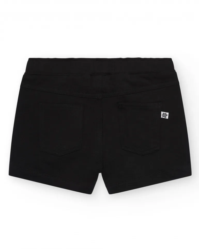 Short pour fille en noir avec taille élastique et poches.