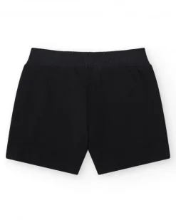 Short pour fille en noir avec taille élastique et poches.